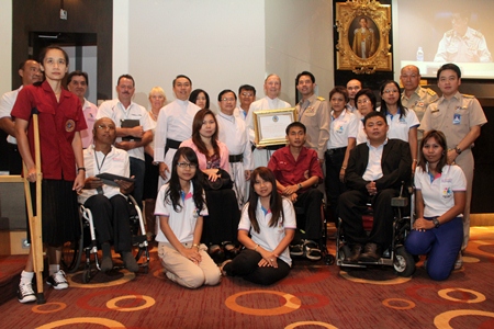 Brother Denis Gervais C.Ss.R. (holding certificate), vice president of the Father Ray Foundation receives a posthumous award on behalf of the late Father Raymond Brennan from Mayor Itthiphol Kunplome (right). The late Father Ray Brennan, an American Redemptorist priest who founded several social projects for underprivileged children and students with disabilities, was an outstanding citizen of the city. Also in attendance were Father Peter Pattarapong Srivorakul C.Ss.R. (left), and Father Michael Picharn Jaiseri C.Ss.R. (second left), president and vice president of the Father Ray Foundation respectively. Father Ray passed away in 2003 and since then the Father Ray Foundation has continued his work and currently cares for more than 850 needy children, blind students and young adults with disabilities.