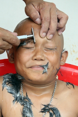 Eyebrows must be shaved bare.