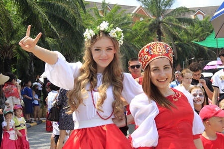 Traditional costumes are worn by many students.
