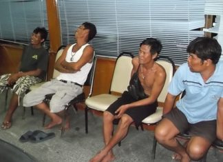 The dastardly gamblers are brought to the police station to face reprimand.