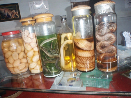 Some of the illegal wildlife contraband found for sale at a Najomtien snake farm.