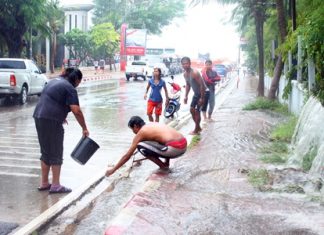 Crafty passersby quickly scooped up the free fish flowing out of the Dusit Thani Pattaya’s fish pond.