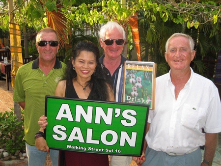 Tuesday’s winners pose for a photo at The Relax Bar.