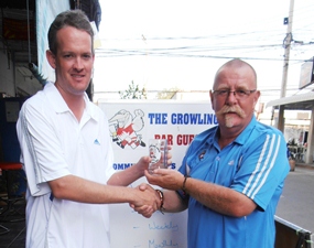 Brad Todd (left) receives the Monthly Mug from Peter Grey.