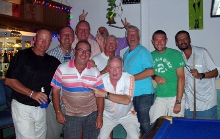 Bob Newell and his friends gather at Paradise Bar following the Birthday Bash golf on Saturday, March 30.