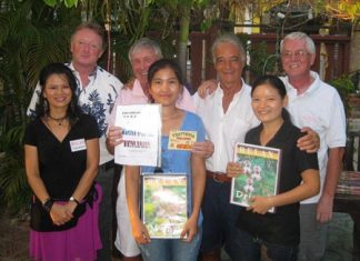 Tuesday’s winners pose with staff at The Relax Bar.