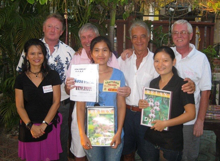 Tuesday’s winners pose with staff at The Relax Bar.