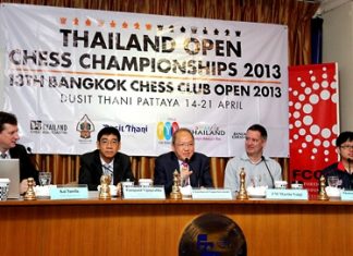 Chatchawal Supachayanont (center), general manager of Dusit Thani Pattaya, gestures as he welcomes the chess players, officials and sponsors of the Thailand Open Chess Championships during the press conference in Bangkok to launch the 13th Bangkok Chess Club Open.