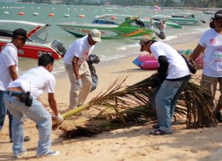 Neighborhoods looking better: Tune Hotel Pattaya staff remove litter and debris from Pattaya’s beach front.