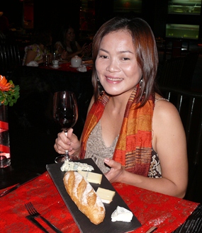 Som Corness readies herself to chose from the assortment of cheeses.