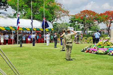 Flags to half mast, standard dips and those with head gear salute.