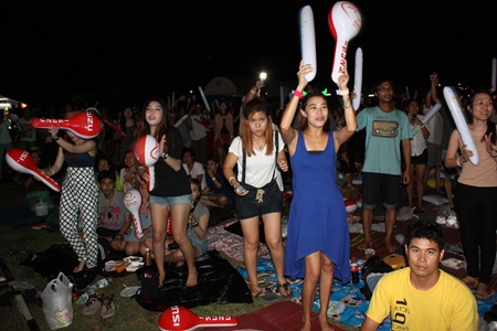 Music gets the fans to their feet at the festival.