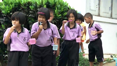 Children enjoy brushing their teeth with fresh clean water.