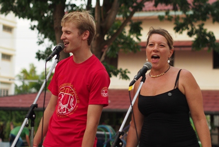 Staff perform a vocal duet.