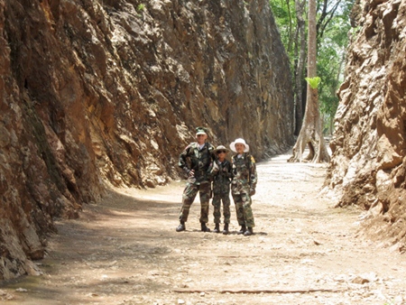 Young Marines in Hellfire Pass. (L to R) Unit Commander Rad, PFC Bret and Adult Leader Nok Mays. (Photo by Adult Leader Joey Fink)
