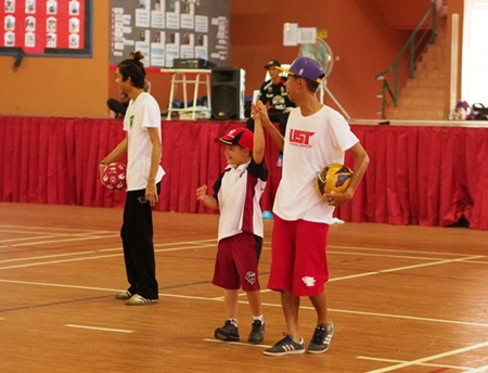 The team also got students involved with football tricks.