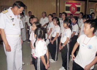 Rear Adm. Noppadol Suphakorn visits with the students attending the camp.