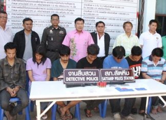 Police introduce the suspects to the media.