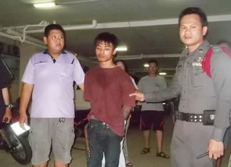 Police bring in the suspect to face burglary charges.