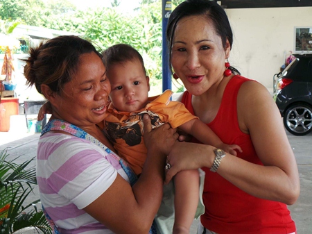 Food vendor Noi Kiankaew (left) contacted Sukanya Seaton from the Seaton Child Development Center to try and find out what to do with the abandoned child.