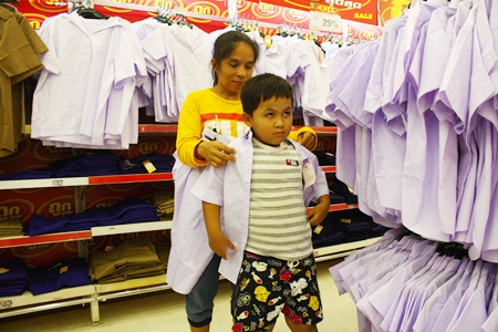 It’s time once again for children to try on their new school uniforms, and although prices have risen, the new minimum wage is making it easier for many parents to pay for them.