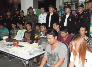 Police bring out the 11 suspects rounded up during the May 2 multiple casino raid.