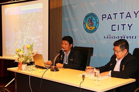 Sanitation engineer Worayuth Khlaplod (left) explains the city’s preparedness for the upcoming rainy season, as Deputy Mayor Verawat Khakhay (right) listens in.