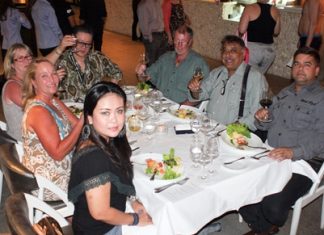 Invited guests and management enjoy the great opening day spread.
