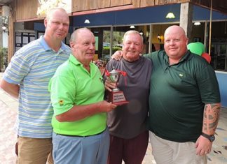 Bob Lindborg presents the winning pairs trophy to Joe Mooneyham, with the runners up Mark Riggall (left) and Scotty Qua (right).