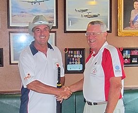 Dick Warberg (right) presents The MBMG Group Golfer of the Month award to Mike Gaussa.