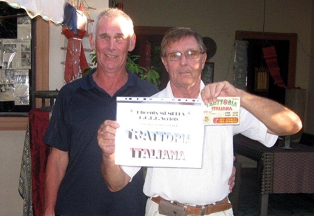 Tuesday winner Mike Gerrard (right) receives his prize standing next to Kevin Bird.