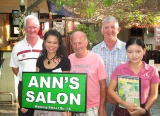 Another Browne bombshell Tuesday’s winners pose with staff at The Relax Bar.