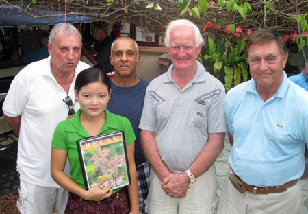 Tuesday winners pose with staff at The Relax Bar.