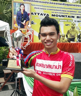 Chinapat Sukhsaen from Chonburi Forest Municipality office shows off his HRH Princess Chulabhorn trophy after winning the General Public category.