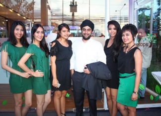 Prab Thakral, Managing Director of the Boutique Group (3rd from right) poses with the sales and promotion team at the celebration party for Treetops Pattaya, May 17.