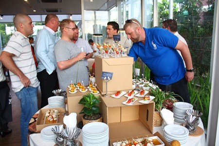 Real estate agents and media enjoy the party to celebrate 50% sales in Treetops.