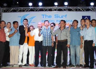 Developers Phaisan Bunchuen and Wanchai Saelim pose with public dignitaries and officials at the launch of The Surf condominium project, Saturday, May 18.