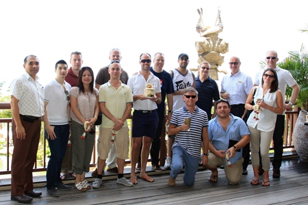 Wuthisak Pichayagan (left), executive assistant manager for food and beverage, and George Kenton (back row, 2nd right), executive assistant manager for rooms of the Centara Grand Mirage Beach Resort Pattaya welcomed a group of delegates from the UK during their Thailand Travel Mart visit. The TTM Fam-trip was hosted by the Tourism Authority of Thailand and Centara Hotels & Resorts. Picture shows the group leaders: Ian Mills (front row, 3rd right), Centara representative for the UK, Philip Hall (back row, 2nd left), corporate director of sales and marketing of Centara Hotels & Resorts and Chris Lee (front row, 2nd left), trade marketing manager of the Tourism Authority of Thailand, UK and Ireland.