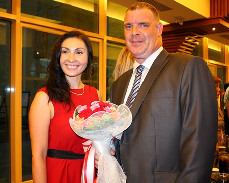 Joe Cox (right), MD of Defence International Security Services, who celebrated his birthday on the same evening as the Pattaya football dinner is congratulated by Irena De Ribas of The Russian Real Estate Magazine.