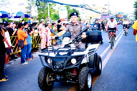 Pol. Lt. Col. Arun Promphan, Pattaya’s Tourist Police commander, leads a patrol team on bicycles in the 6th Eastern Fair parade.