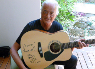 Jimmy Page displays his guitar, which was auctioned off at last year’s Gala Party Night.