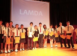 LAMDA students proudly display their certificates.