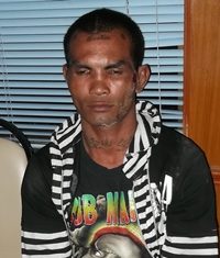 Police bring in the teen to reenact his crime.