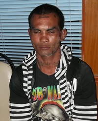 Police bring in the teen to reenact his crime.