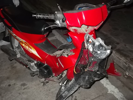 Pibun Yahan’s crumpled Honda Wave motorbike.