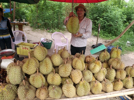 Durian seller Worasak Wongdeephumidol said customers are grumbling about the prices, but most are still buying.