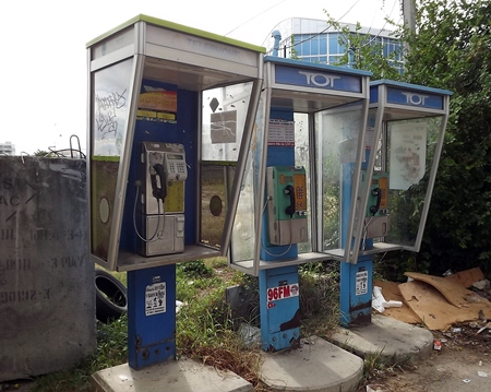 From necessity to eyesore, word has it that some of these phones still actually work.  But fewer and fewer people are using them.