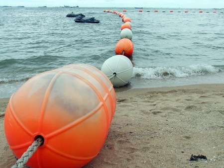 Pattaya officials plan to invest 11.4 million baht to purchase the orange buoys, ropes, anchors and materials for lifeguard stations needed to cordon off two more swimming areas on Naklua and Wong Amat beaches.