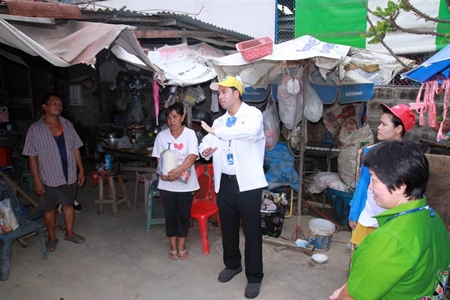 After handing out relief supplies to flood victims, the mayor tells the people that city hall is working on the chronic flooding problem.