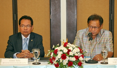 Khajorn Weerachai (left), from the Ministry of Tourism and Sports, and Deputy Governor Adisak Thepass preside over the meeting.